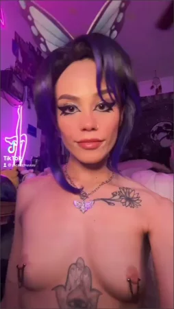 Cosplay girl flashing her pierced tits on TikTok